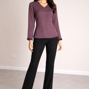 Model wearing Mauve Softline Top in mauve crepe with black lace modest V neckline and beaded flared sleeves, front view on neutral studio background